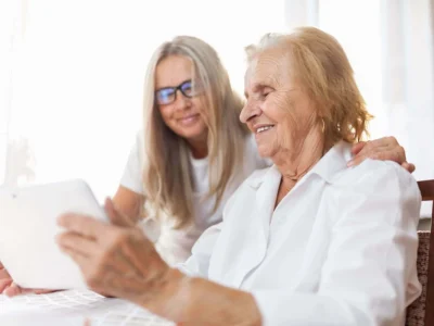 Professional performing cognitive rehabilitation for a person with Alzheimer's disease