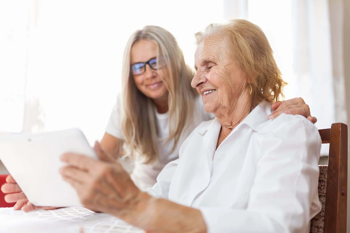 Professional performing cognitive rehabilitation for a person with Alzheimer's disease