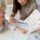 Child undergoing speech-language therapy with a speech-language pathologist for a language disorder or TEL.