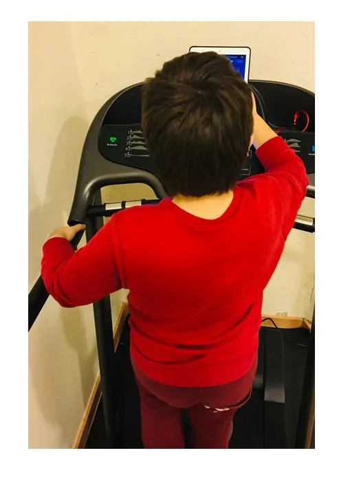 A child working on a machine