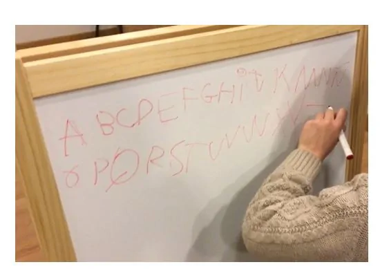 A woman working on literacy