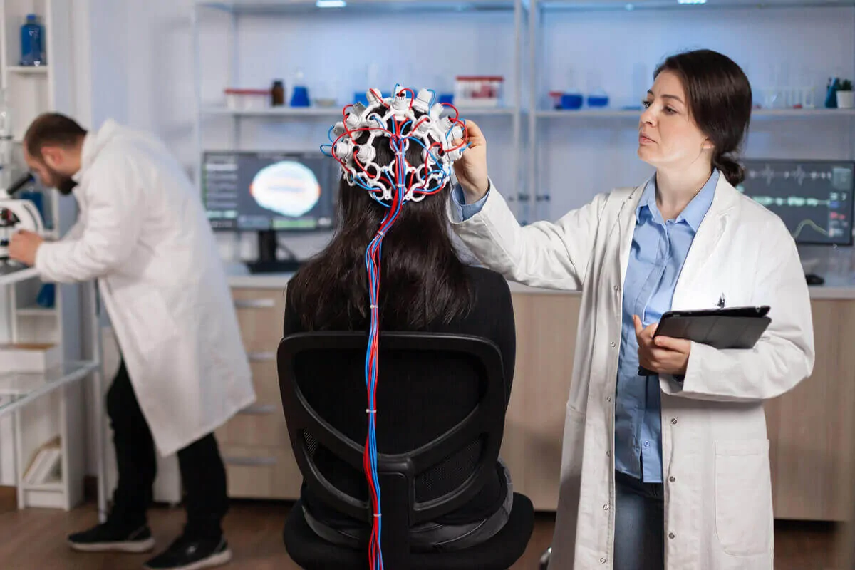 Neurological examination. Female doctor using the neurological examination technique.