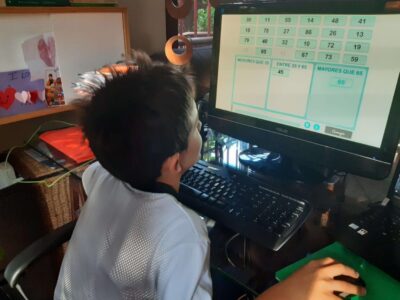 Behavioral re-education through cognitive training. A child performing the NeuronUP activity Put Numbers in Order from home.