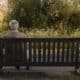 How to fight unwanted loneliness in elderly people. Old man sitting alone on a bench.