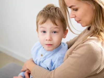 Deconstructing Myhre's Syndrome. Mother holding her child