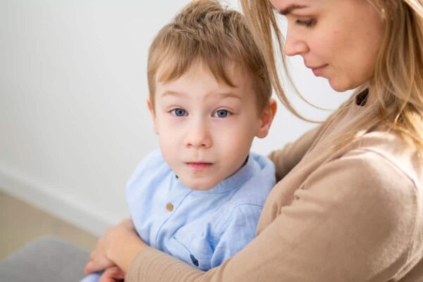 Deconstructing Myhre's Syndrome. Mother holding her child