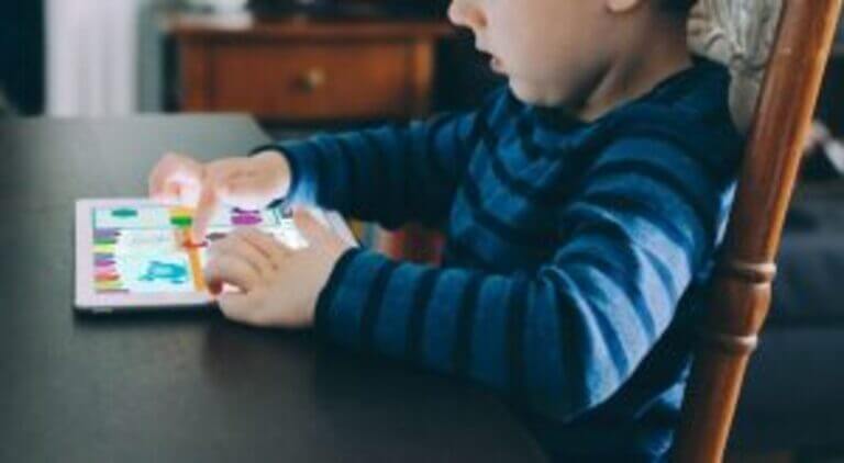 A child completing a NeuronUP session at home