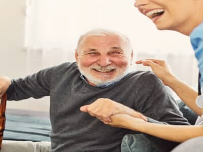 Real testimonials from our customers. Older man smiling during rehabilitation