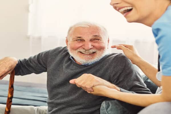 Real testimonials from our customers. Older man smiling during rehabilitation