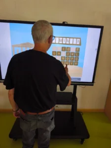 User at Espartales Sur Residence using NeuronUP with a screen.