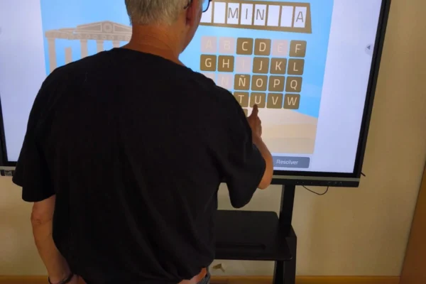 User at Espartales Sur Residence using NeuronUP with a screen.